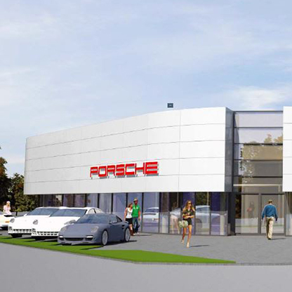 Modernes Porsche-Autohaus mit einer glasfrontigen Fassade. Vor dem Gebäude stehen mehrere Porsche-Fahrzeuge. Menschen betreten und verlassen das Autohaus. Eine grüne Rasenfläche umgibt das Gebäude. Der Schriftzug „PORSCHE“ ist prominent in Rot an der Fassade angebracht.