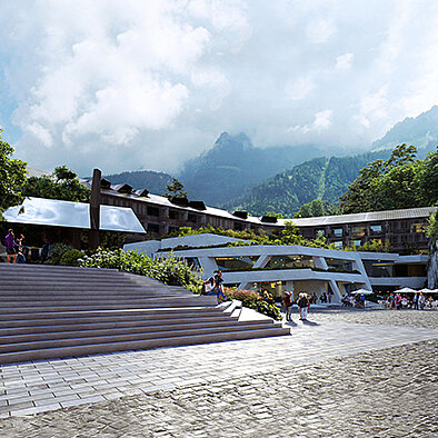 Architektonische Darstellung eines modernen Gebäudes in einer bergigen Landschaft. Es zeigt Treppen, die zu einem Eingang führen, umgeben von üppigem Grün. Wolken ziehen über den Bergen, während einige Personen im Vordergrund sichtbar sind.