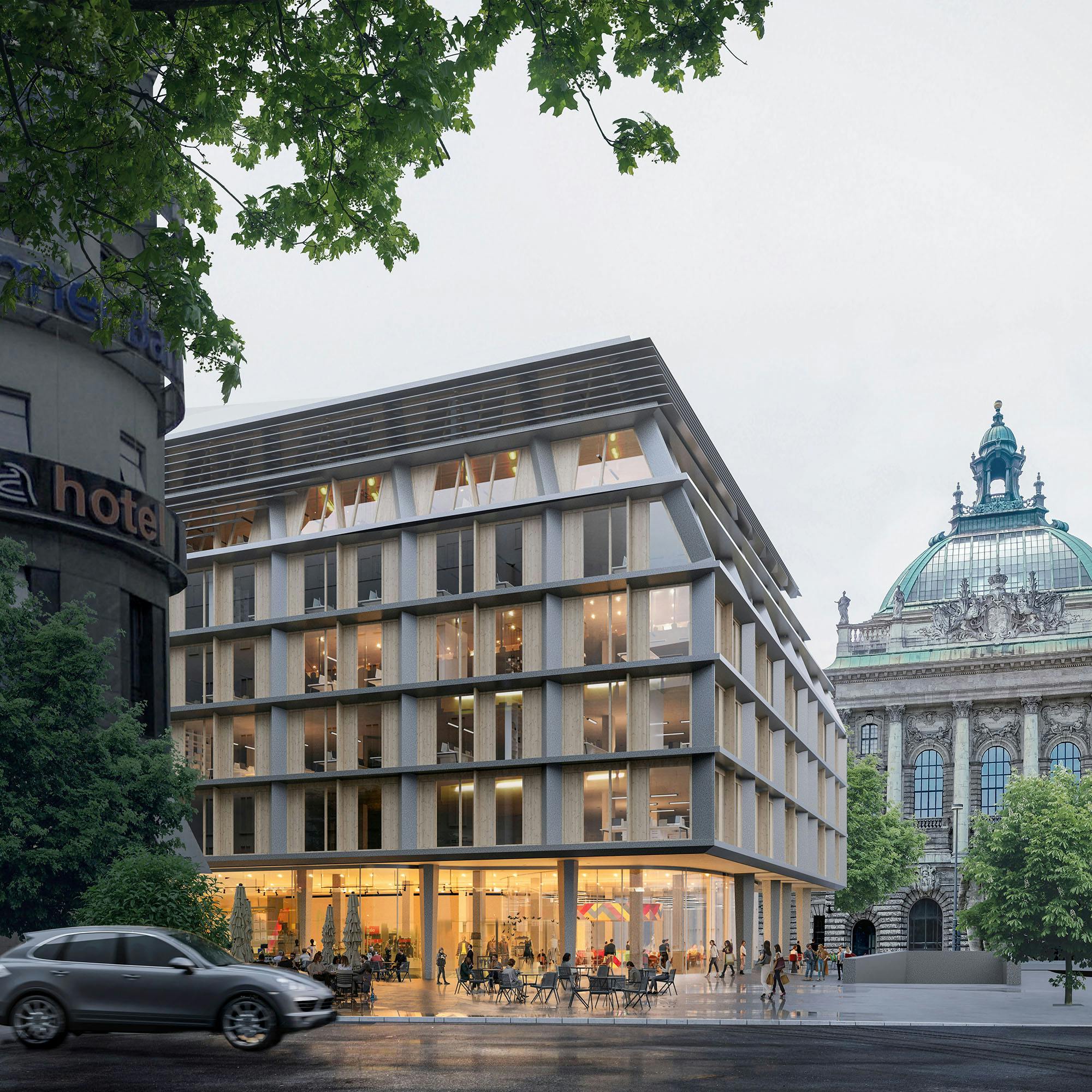 Moderne Architektur eines Mehrfamilienhauses mit großen Fenstern und einem einladenden Erdgeschoss. Im Hintergrund ist ein historisches Gebäude mit einer markanten Kuppel zu sehen. Die Umgebung ist grün und urban, mit einer Straße und einigen Menschen vor dem Gebäude.